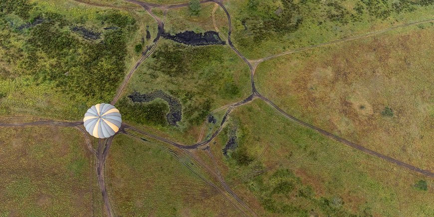 Hot air balloon seen from above on the Serengeti